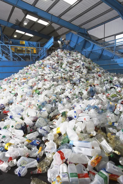 Used plastic bottles on conveyor belt