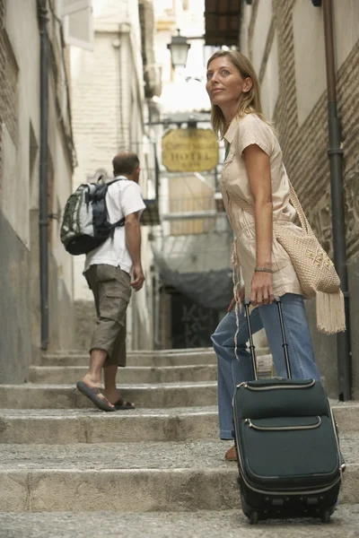 Woman tourist with Luggage