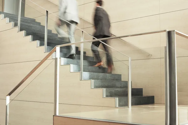 Businessmen Climbing Stairs