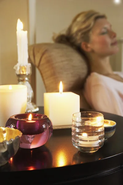 Woman Relaxing with Candles