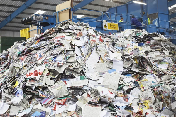 Pile of recycled paper in factory