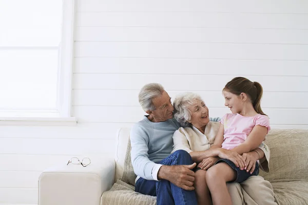 Grandparents With Granddaughter