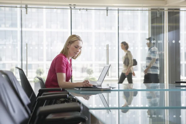 Office worker using laptop