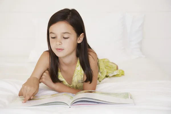 Girl reading story book