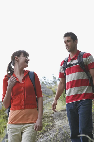 Couple walking in countryside