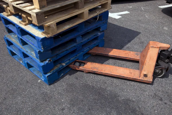 Forklift and wooden crates