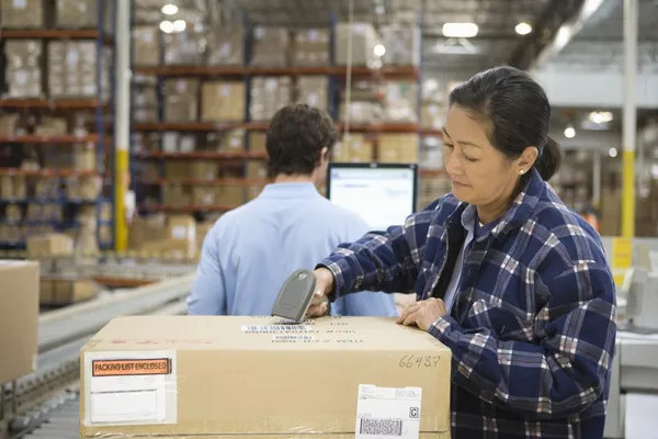 Woman with bar code reader