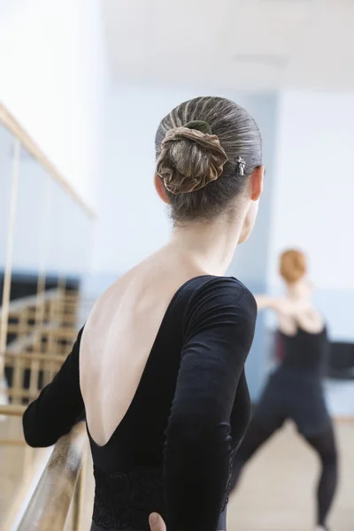 Woman in ballet rehearsal room