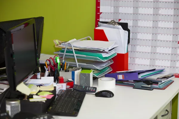 Real life messy desk in office