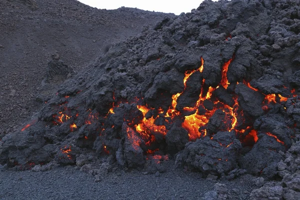 Glowing molten volcanic rock