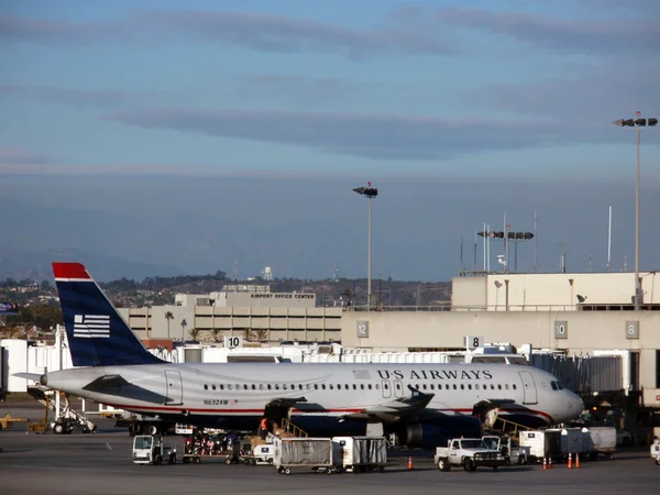 US Airways Plane is loaded up with bags for upcoming flight