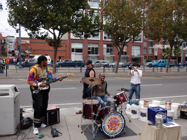 Giants fans play music outside stadium before the start of game