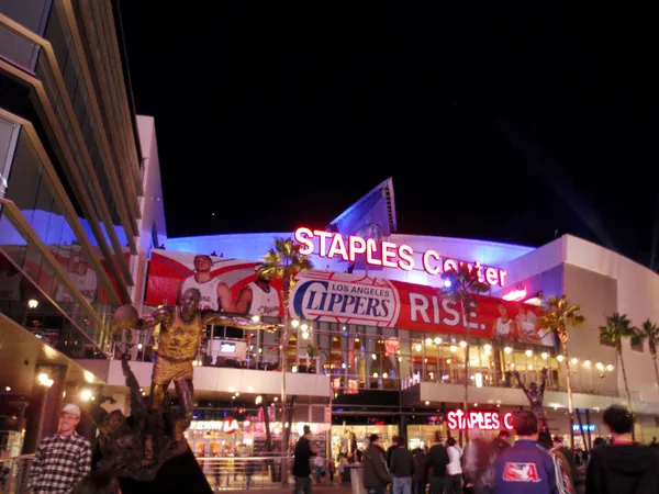 Fans enter Staples Center during Clippers game at night