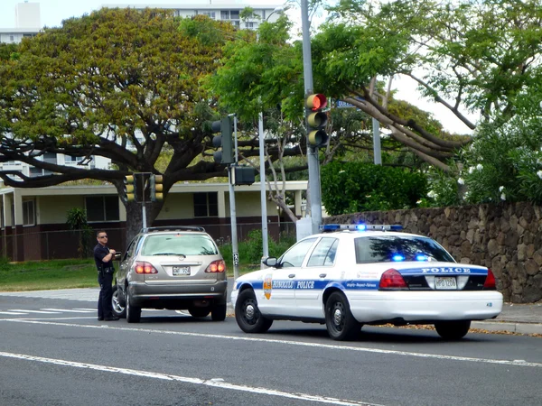 Honolulu Police Department police officer pulls over SUV car on