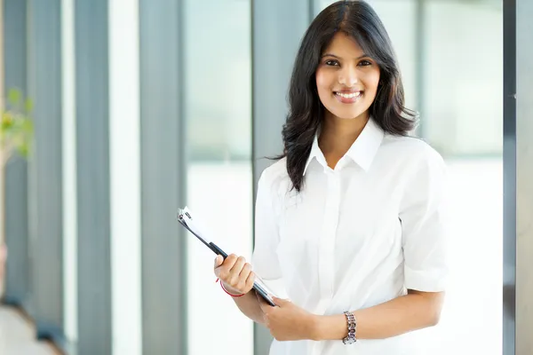 Young indian businesswoman in office