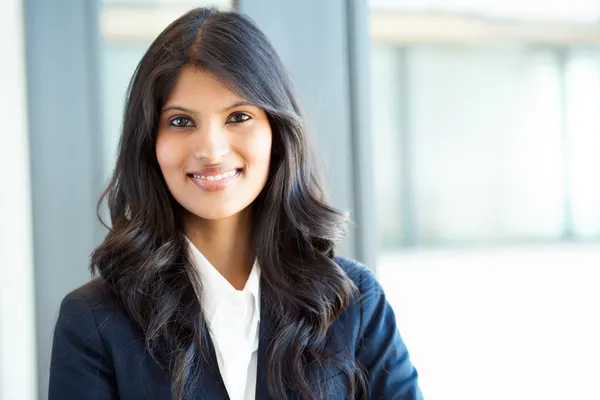 Young indian businesswoman portrait in office