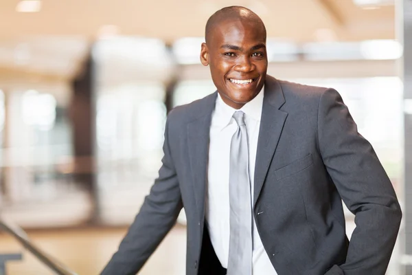 Cheerful african american business executive in office