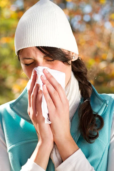 Young woman season change allergy