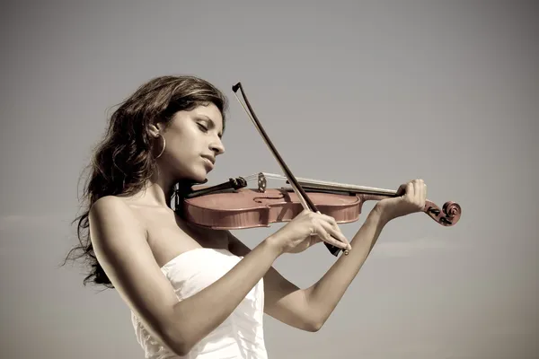 Peaceful violinist playing violin