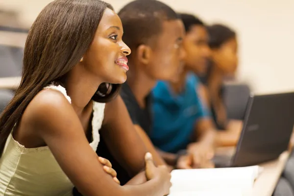 Group of african american university students in lecturing hall