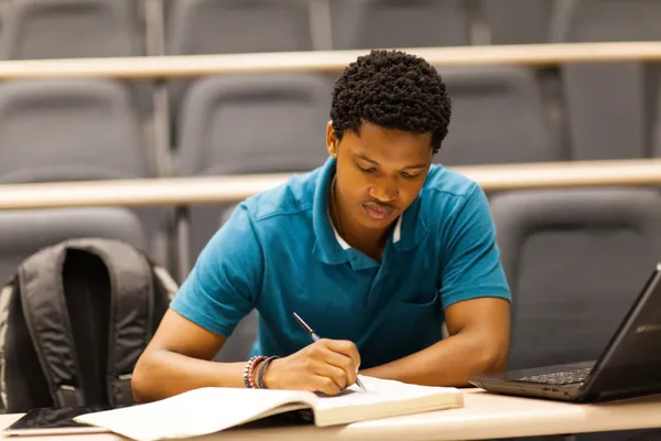 Male african college student in lecture room