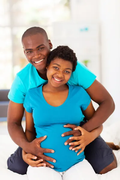Happy african american couple expecting baby