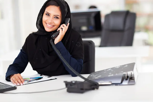 Arabian office worker on the phone