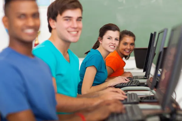 Group of high school students using computers
