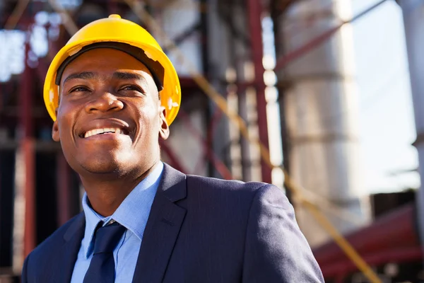 African industrial manager at oil refinery plant