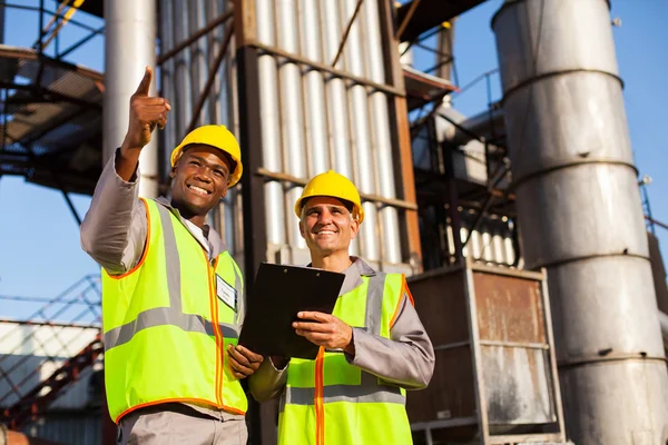 Fuel chemical workers at refinery plant