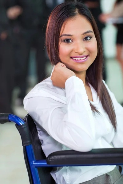 Disabled office worker in a wheelchair