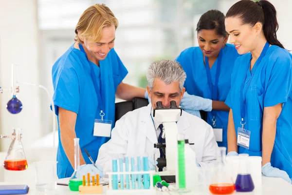 Group of scientists working in lab