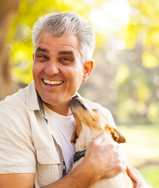 Middle aged man and pet dog