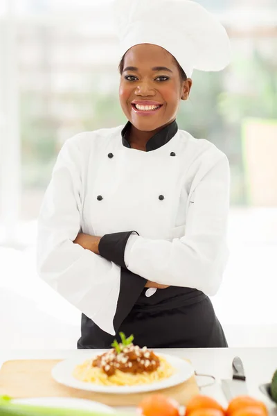 Female african chef with arms crossed