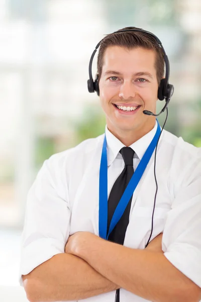 Call center customer service worker with arms crossed