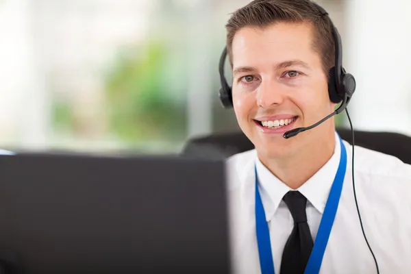 Male customer support operator with headset