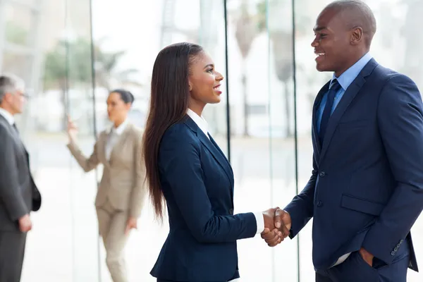 African business people handshaking