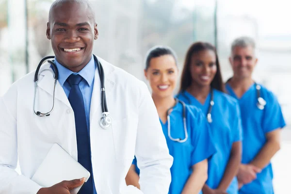 Young african american doctor and colleagues