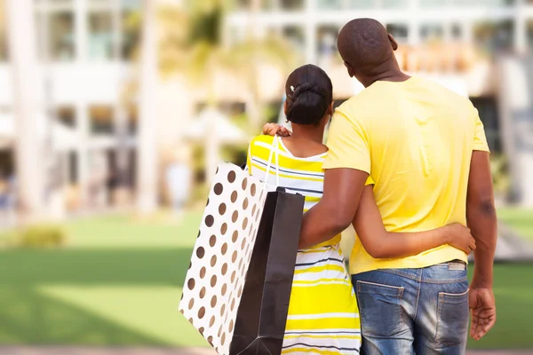 Young african couple buying modern apartment