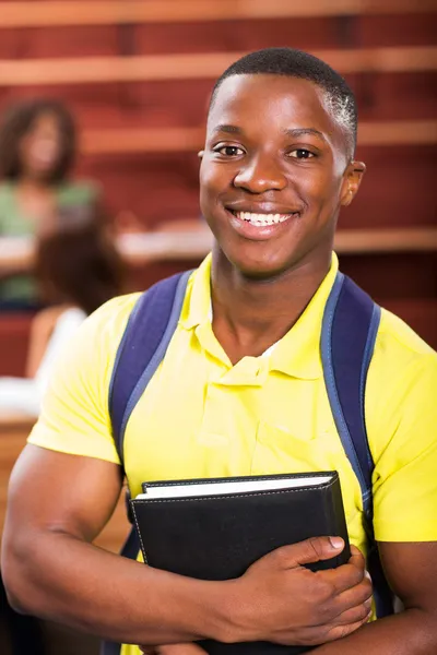 American college student holding book