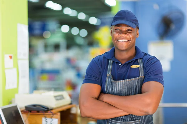 African supermarket cashier