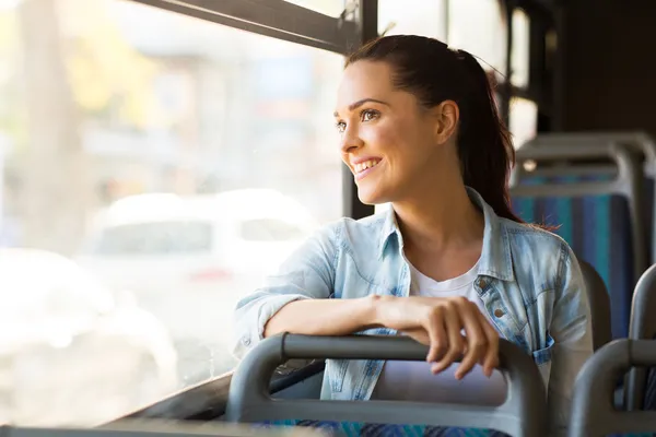 Woman taking bus to work