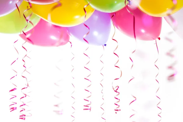 Balloons with streamers for birthday party celebration isolated