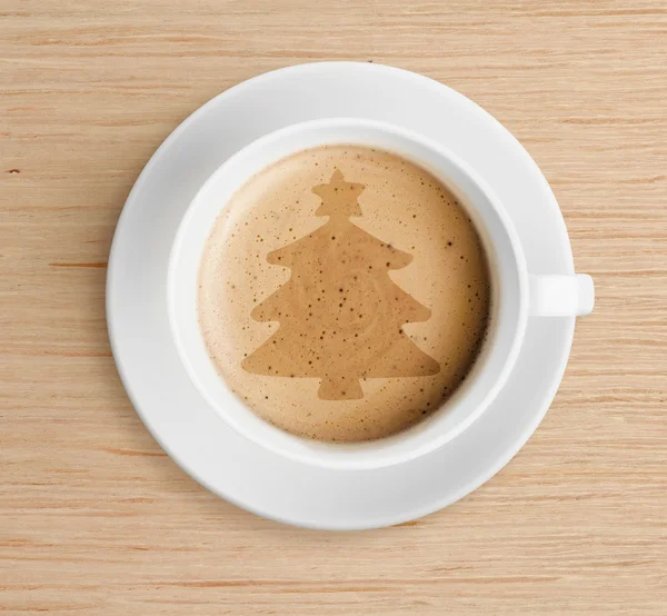 Coffee cup with christmas tree shape on foam
