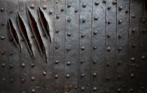 Monster claw scratches on metal wall or door background