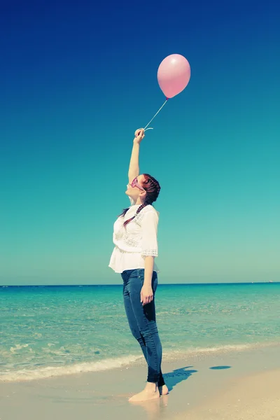 Woman with balloons