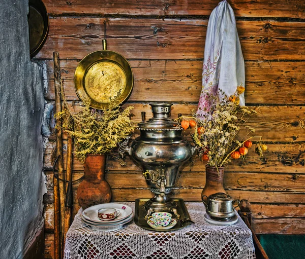 Interior of Russian log hut with elements of the old way of li