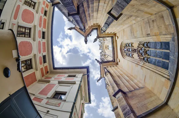 Fisheye lens look of the Old Town on sky background . Prague