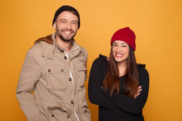 Trendy young couple with winter clothing