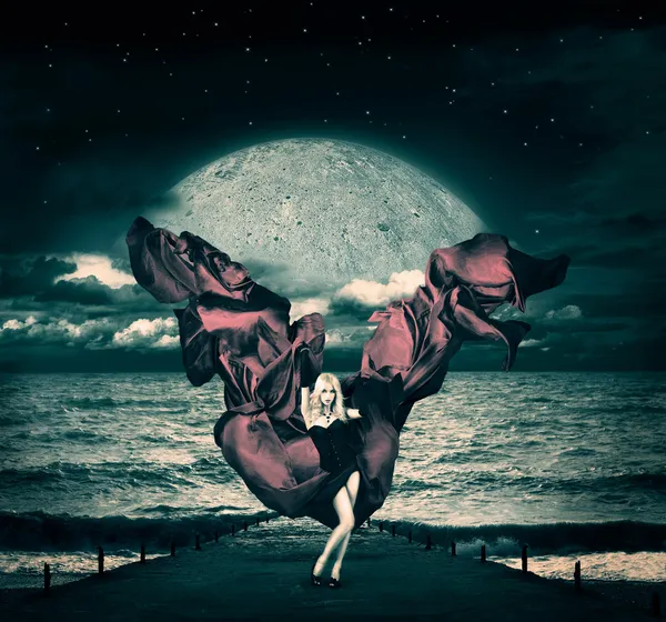 Fantasy Woman with Waving Silk at Stormy Sea